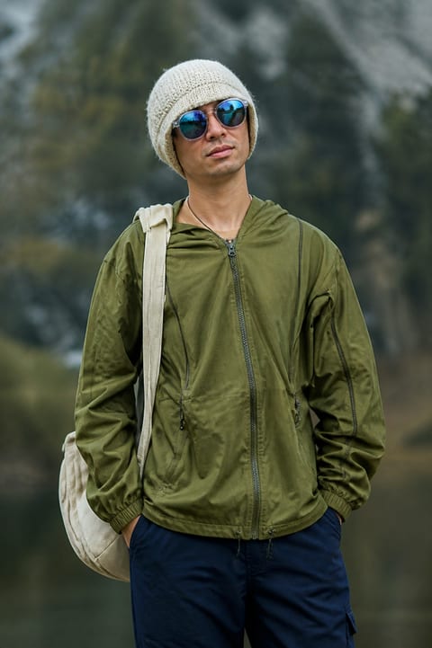 Olive travel layer in a mountain setting