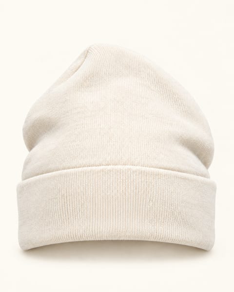 Rib knit folded beanie in ivory, front view