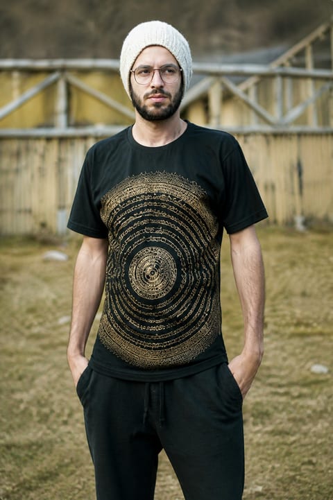 Black graphic hemp shirt worn outdoors