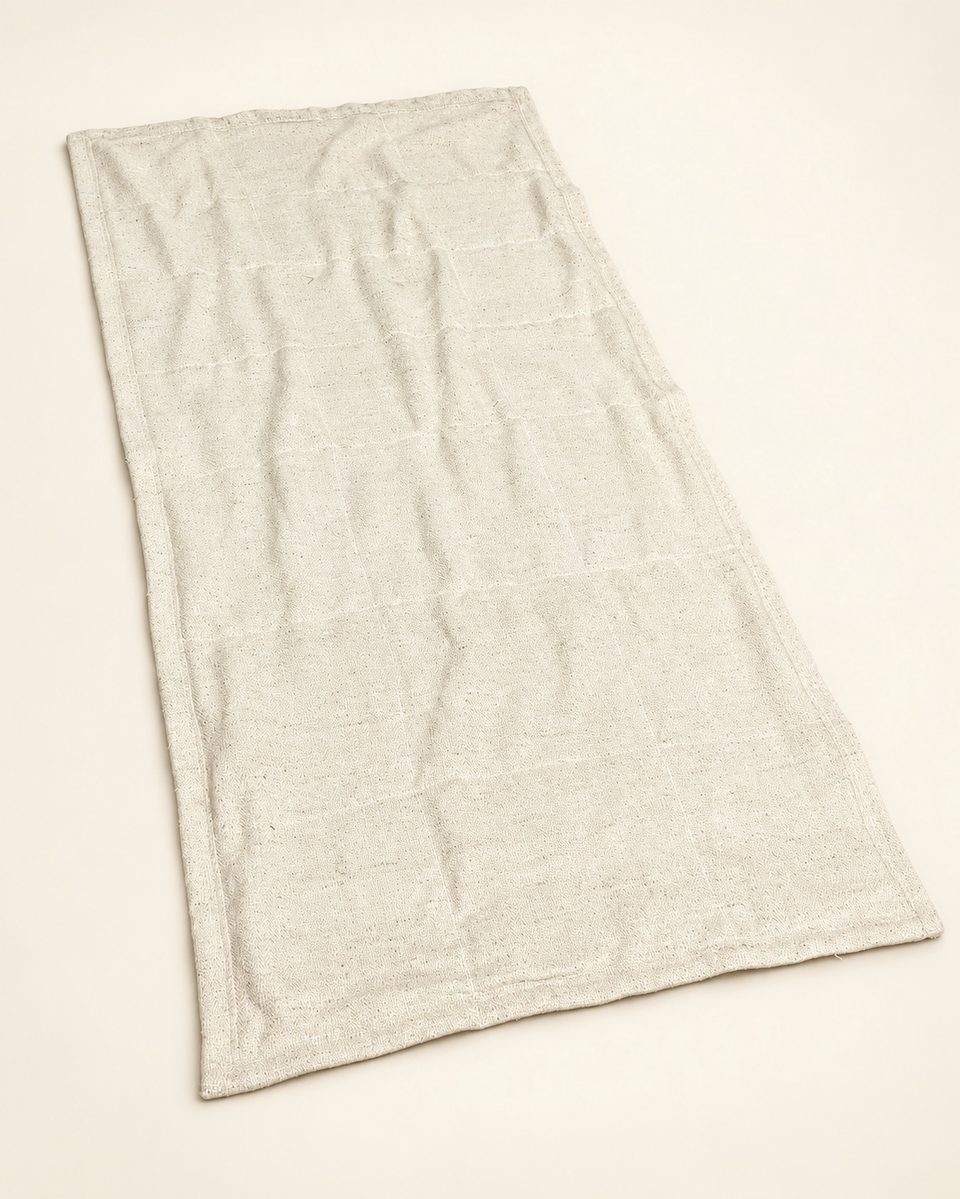 Rectangular woven textile in ivory, front view