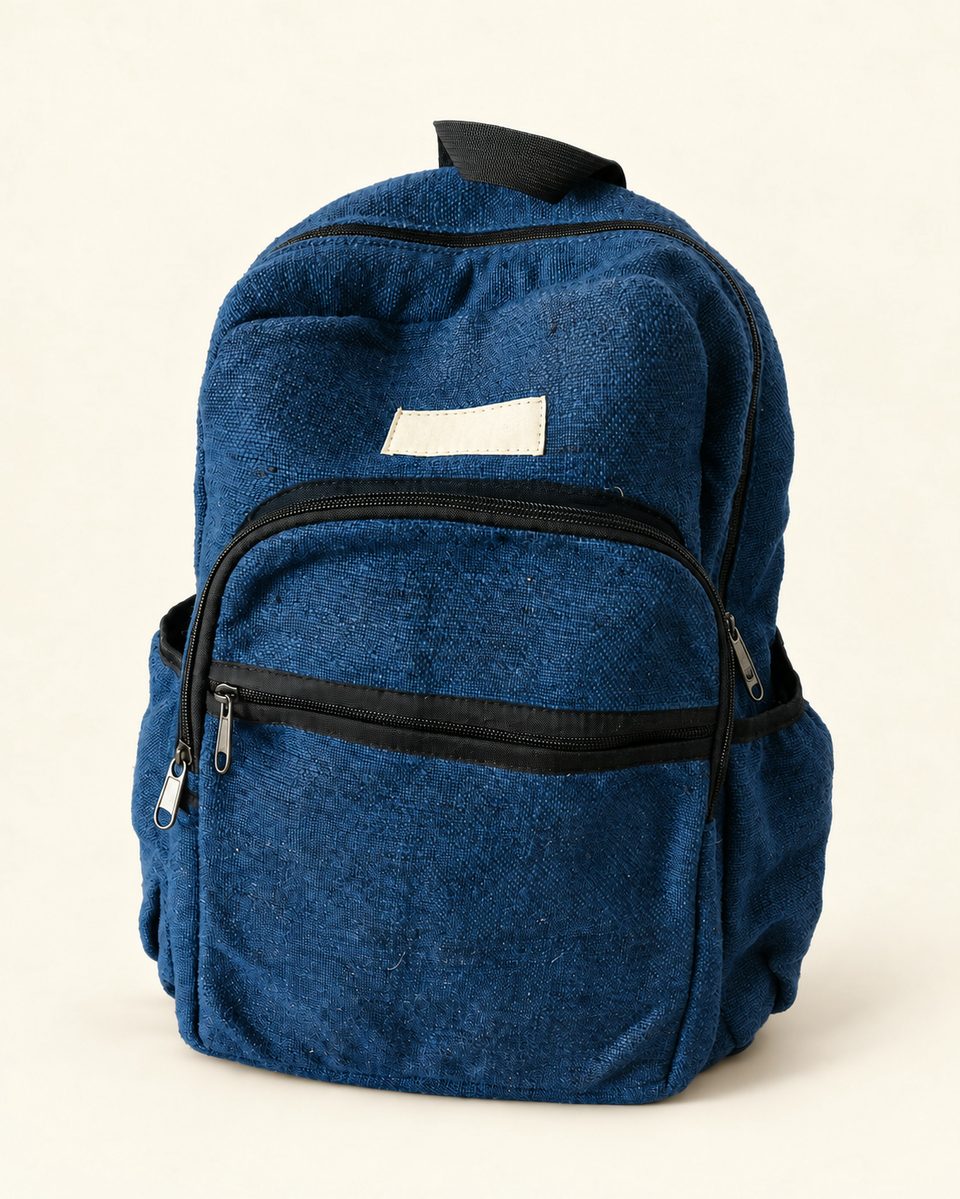 Multi zip backpack in dark / denim / blue, front view