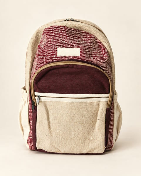 Front pocket backpack in maroon / cream, front view