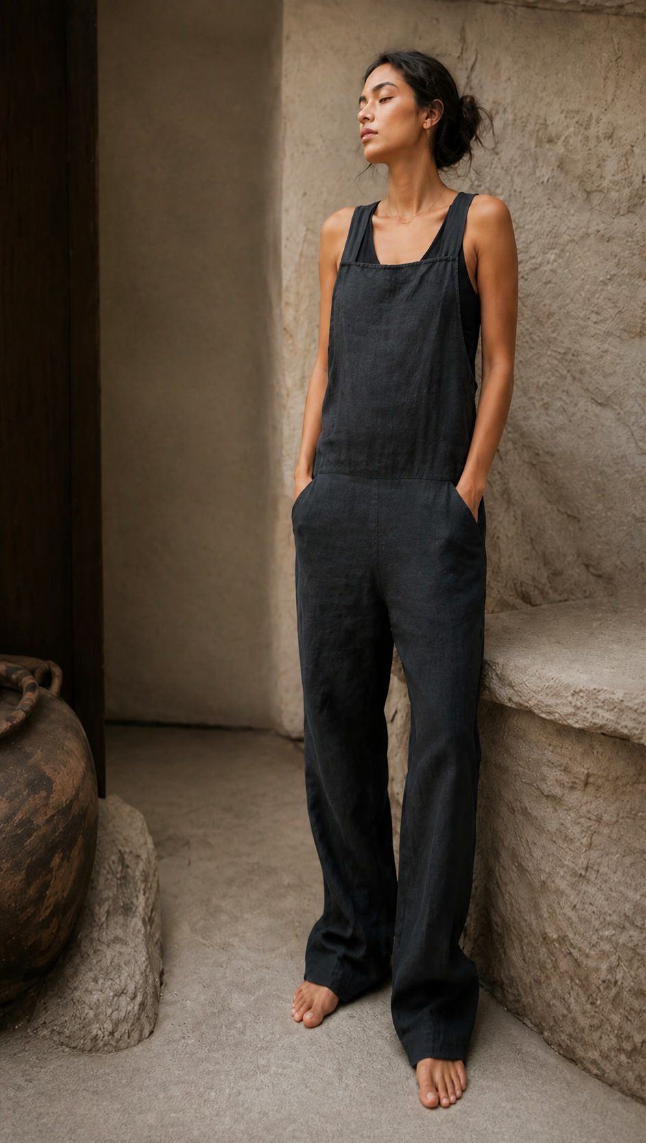 Woman wearing a charcoal hemp overall